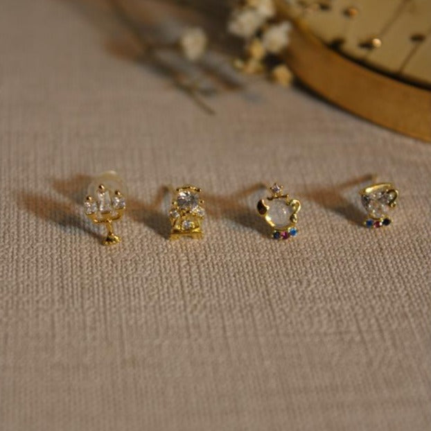 Set de 4 Aretes Disney Bella y la Bestia